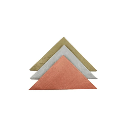 Three folded paper napkins in gold, silver, and copper colors.