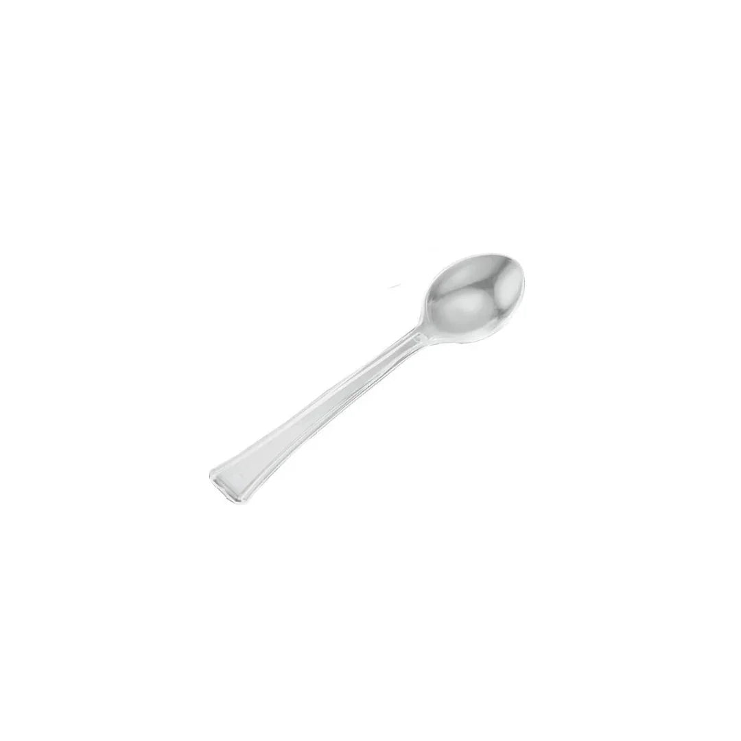 Single disposable clear plastic spoon isolated on a white background