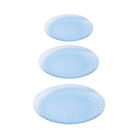 Three light blue textured plastic plates of varying sizes arranged vertically