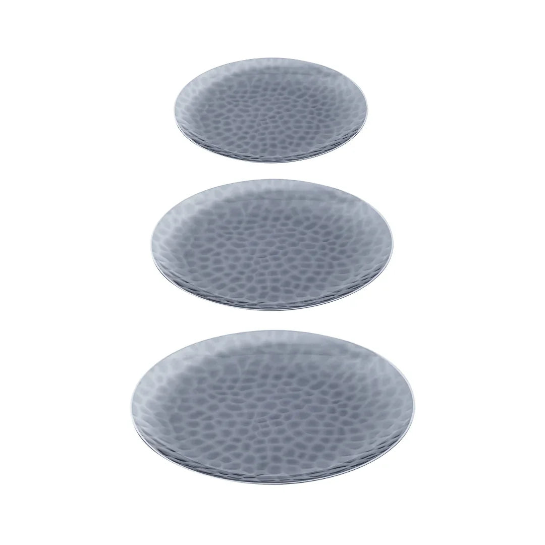 Three silver textured disposable plates in varying sizes