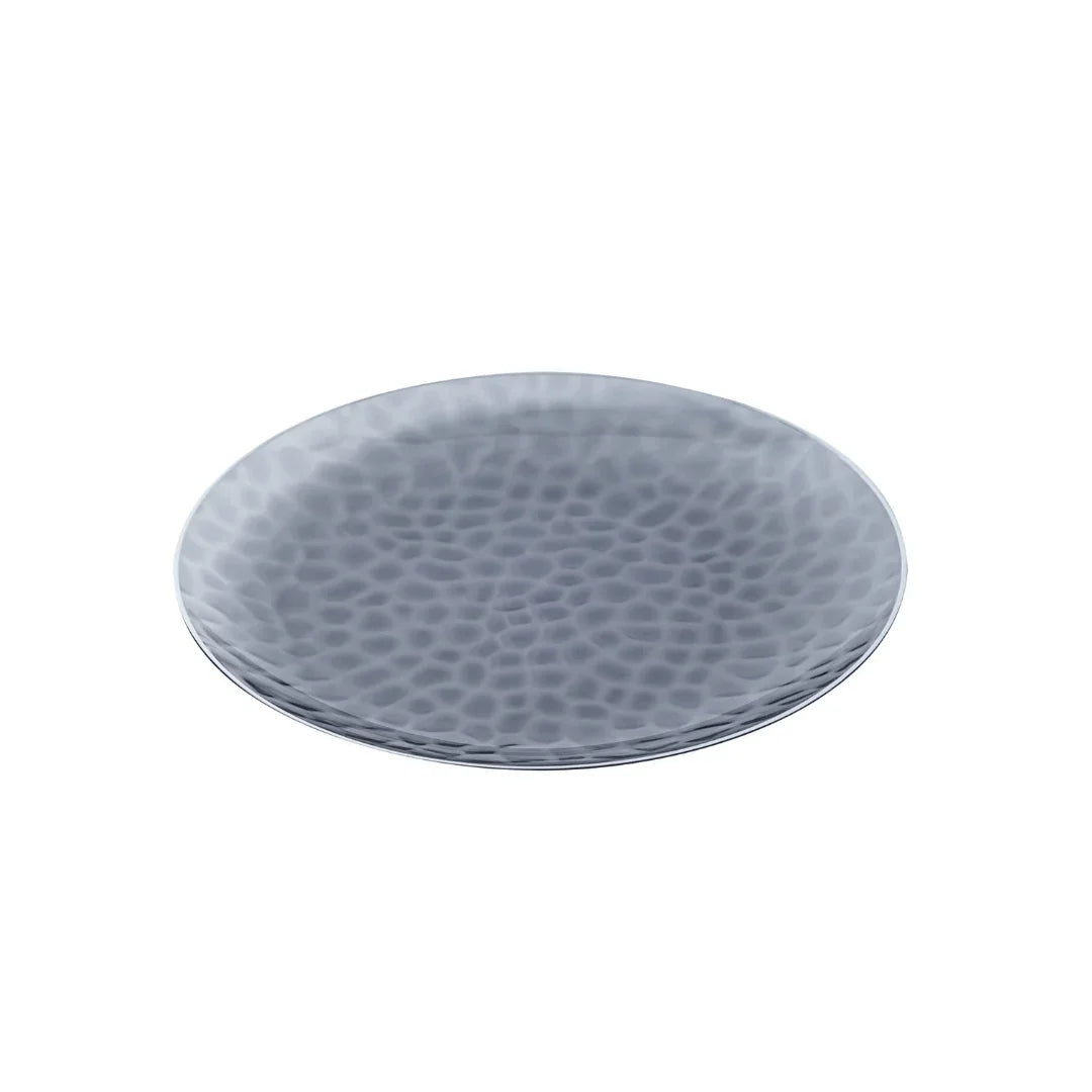 Round hammered silver metallic platter on a white background