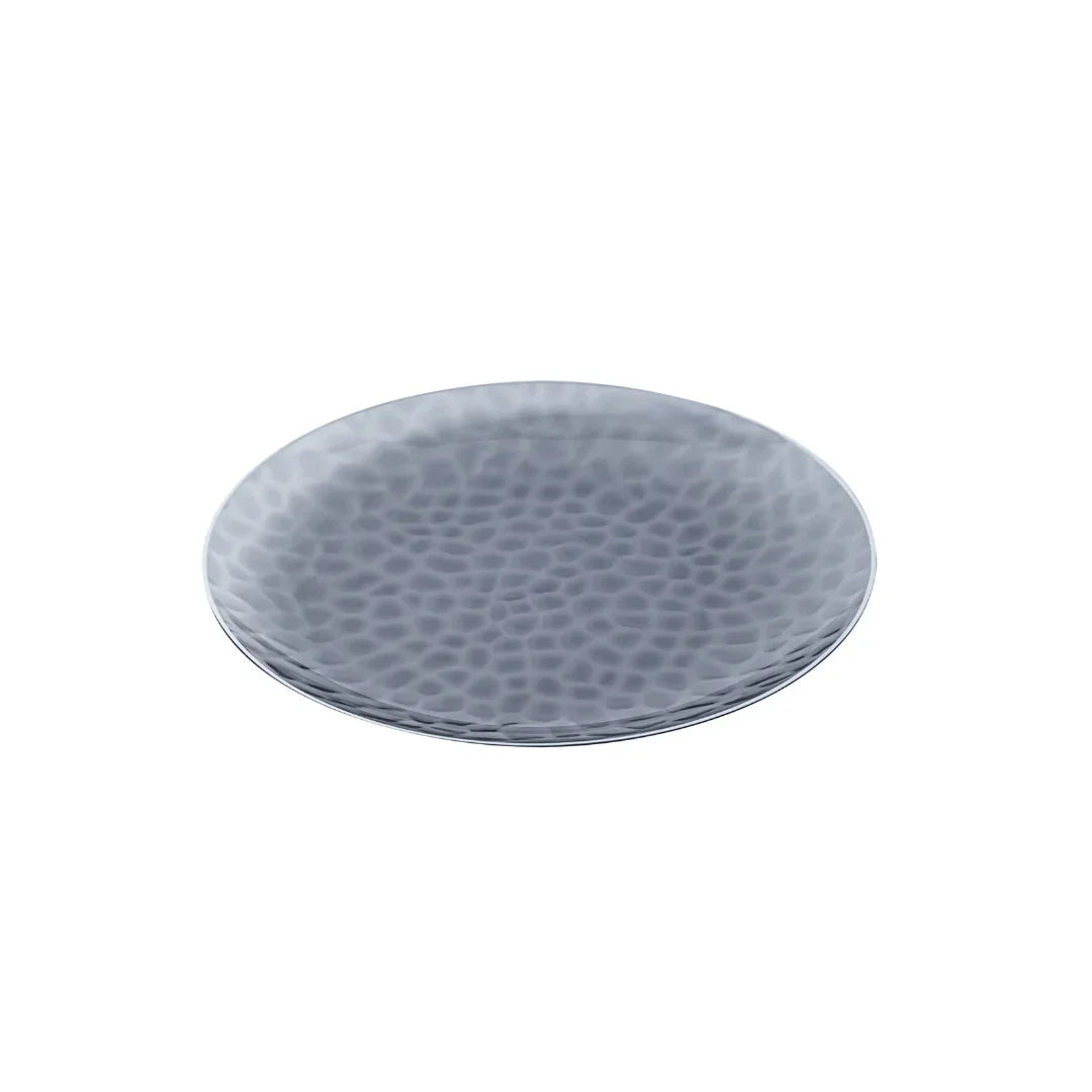 Silver hammered metal decorative platter on a white background
