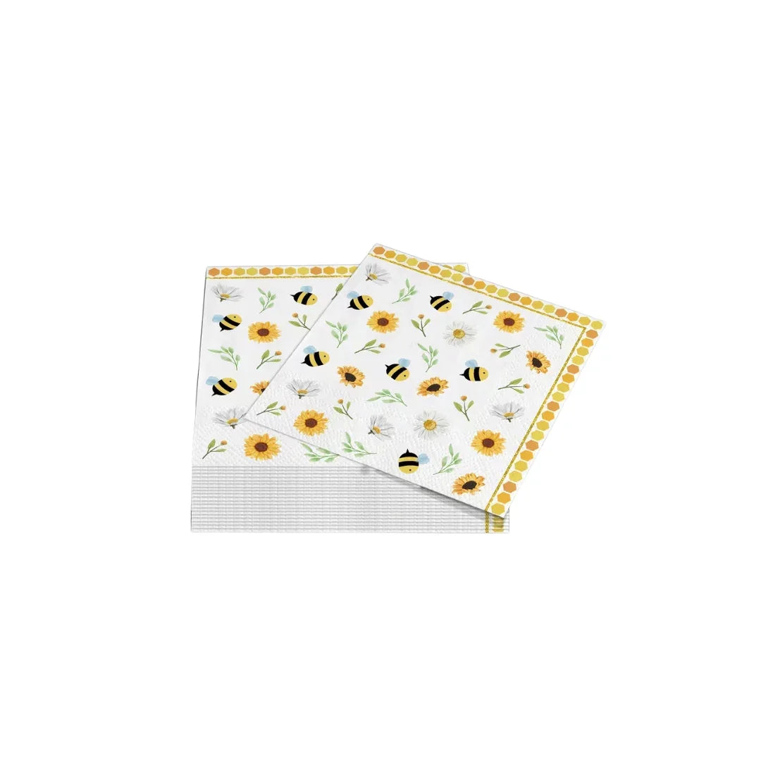 Paper napkins with a pattern of bees, sunflowers, and a yellow dotted border