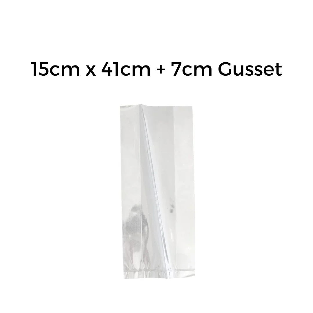 Clear plastic gusseted packaging bag measuring 15cm x 41cm + 7cm gusset