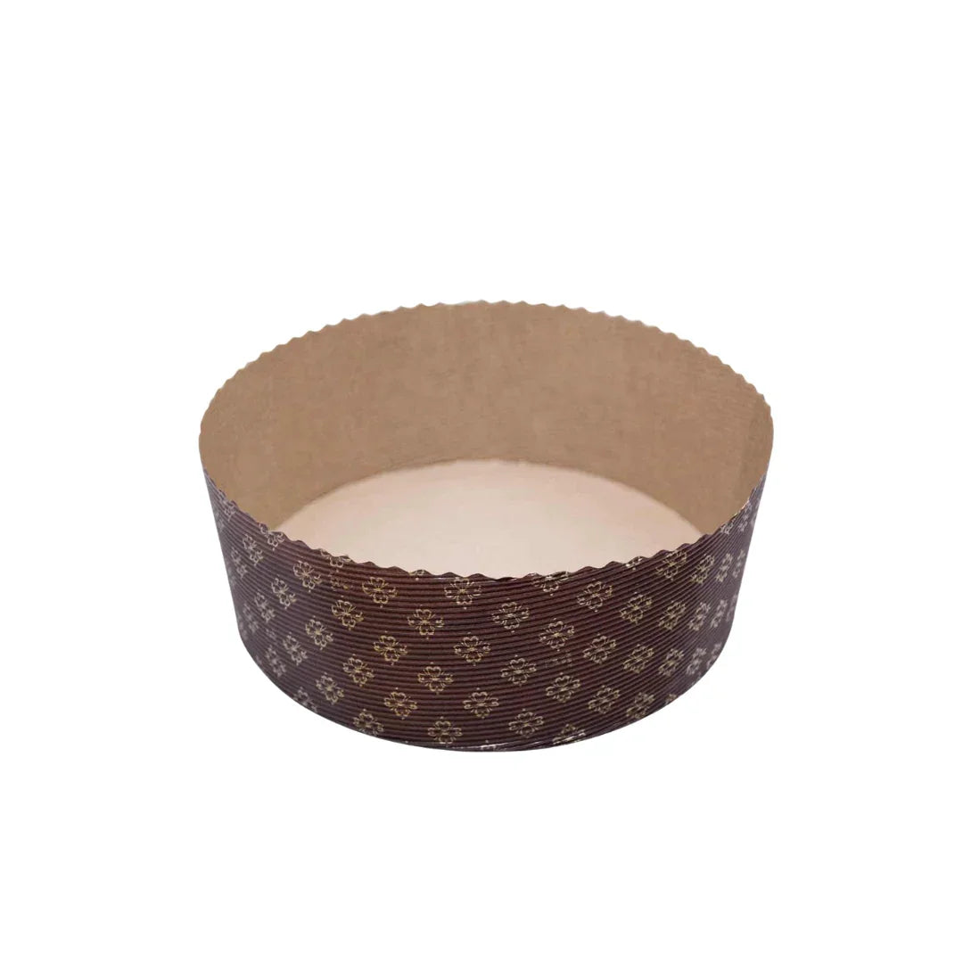 Brown patterned paper baking mold with a scalloped edge