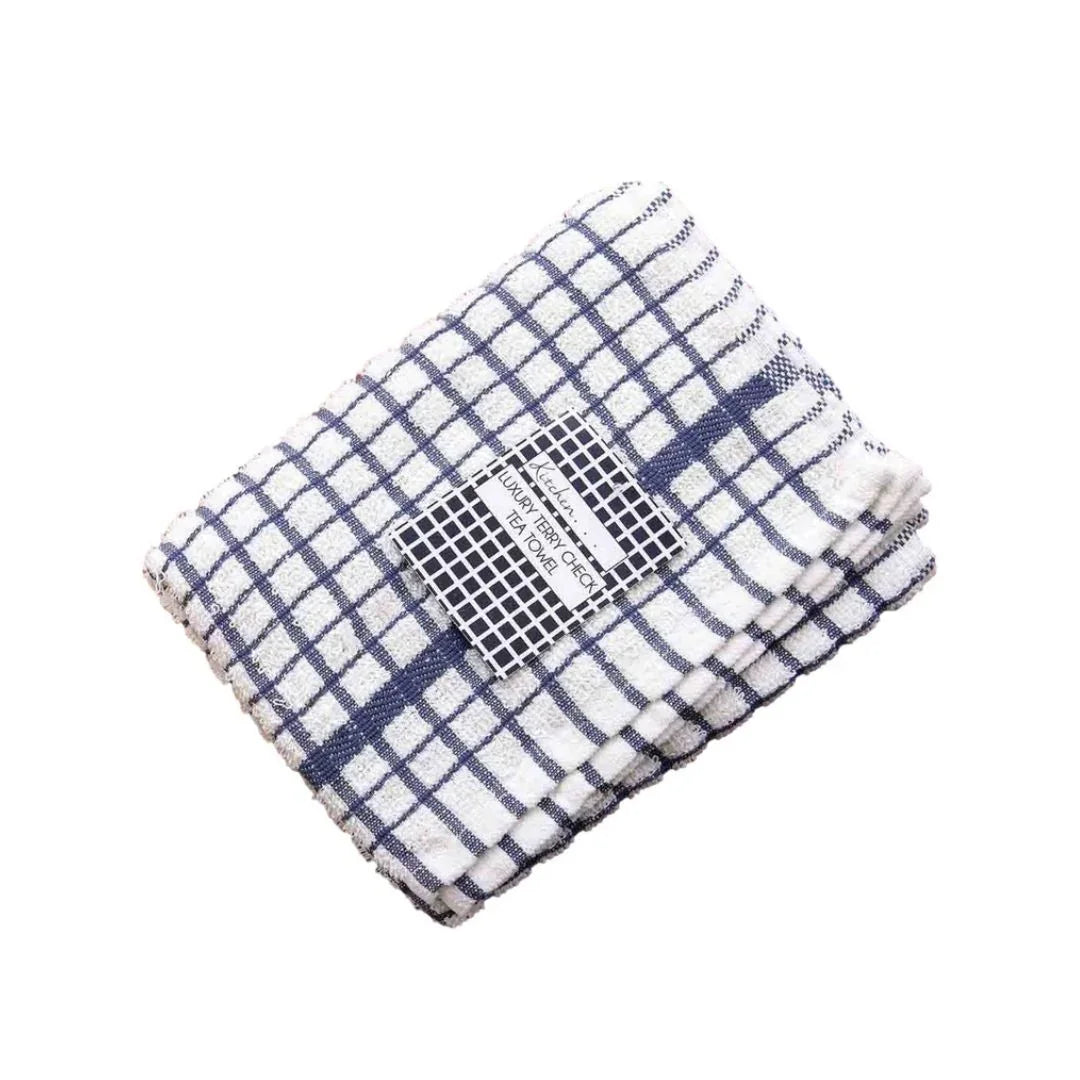 Folded navy blue and white checkered luxury tea towel with product label