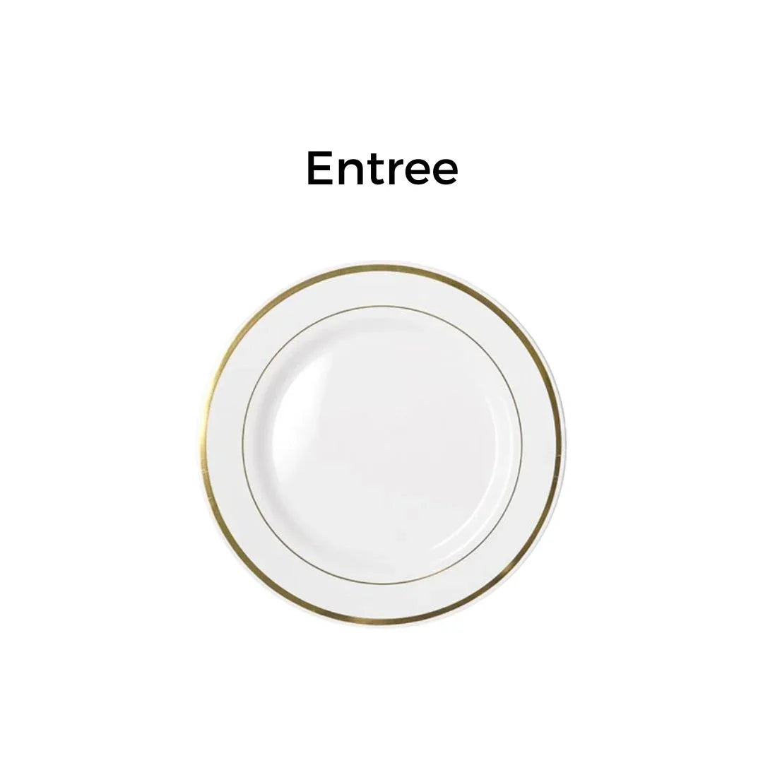 White disposable entree plate with a gold rim border