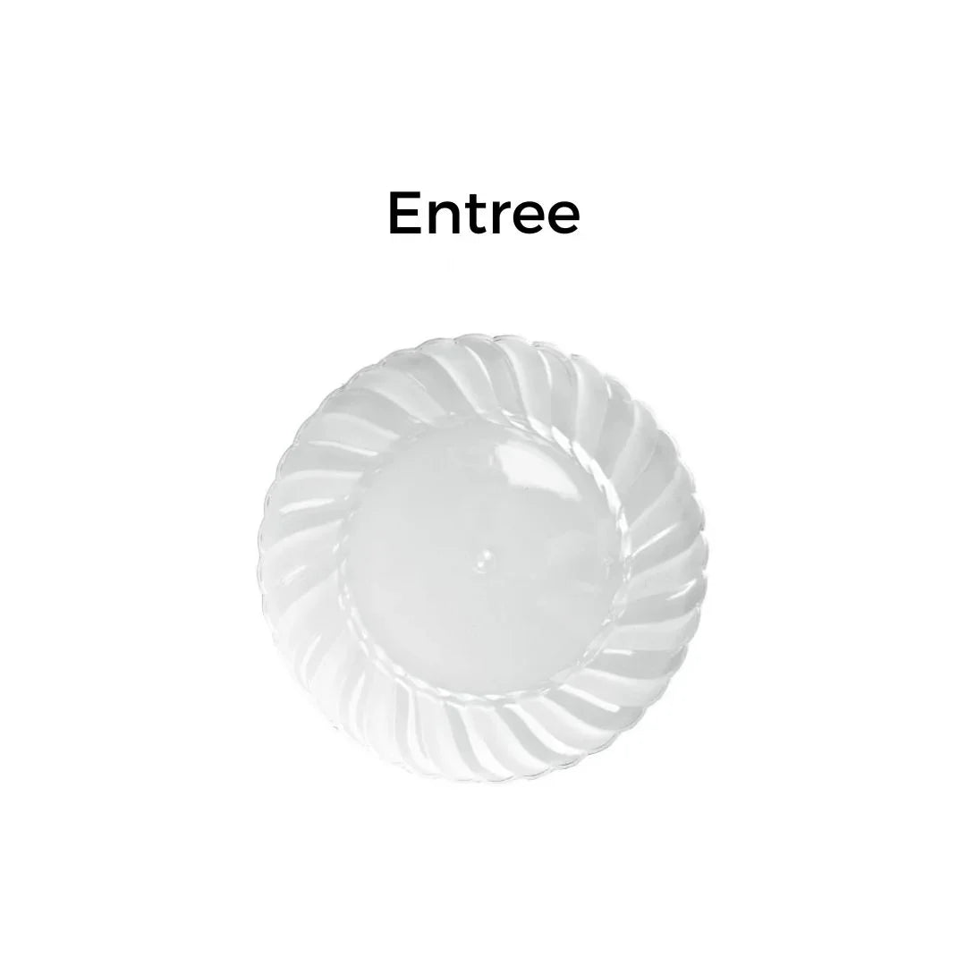 Clear plastic fluted entree plate on a white background