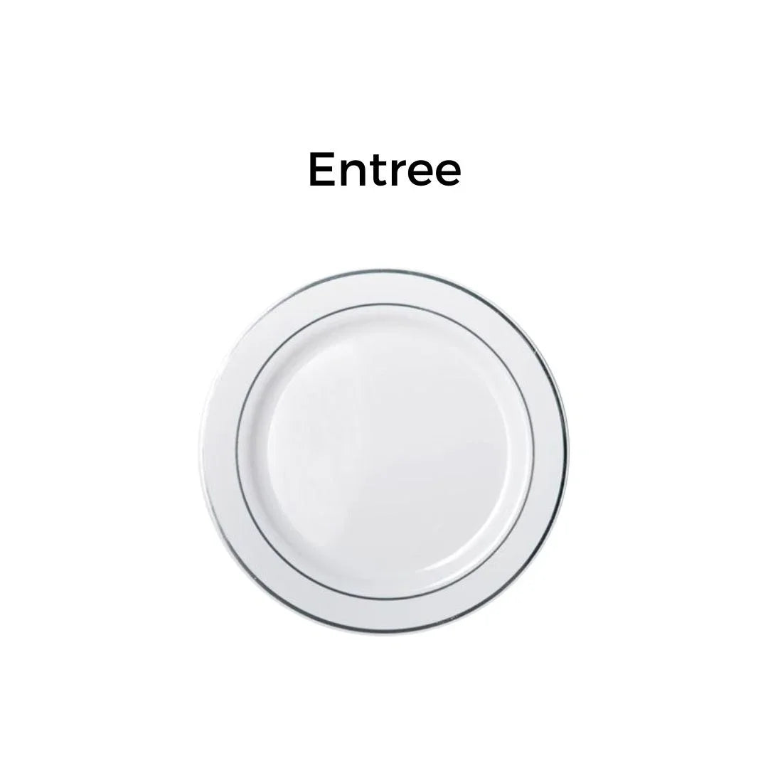 White ceramic entree plate with a thin blue rim