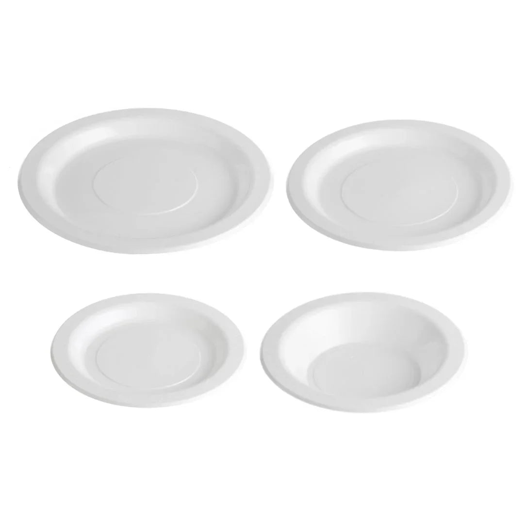 Set of four white disposable plastic plates and bowls in various sizes