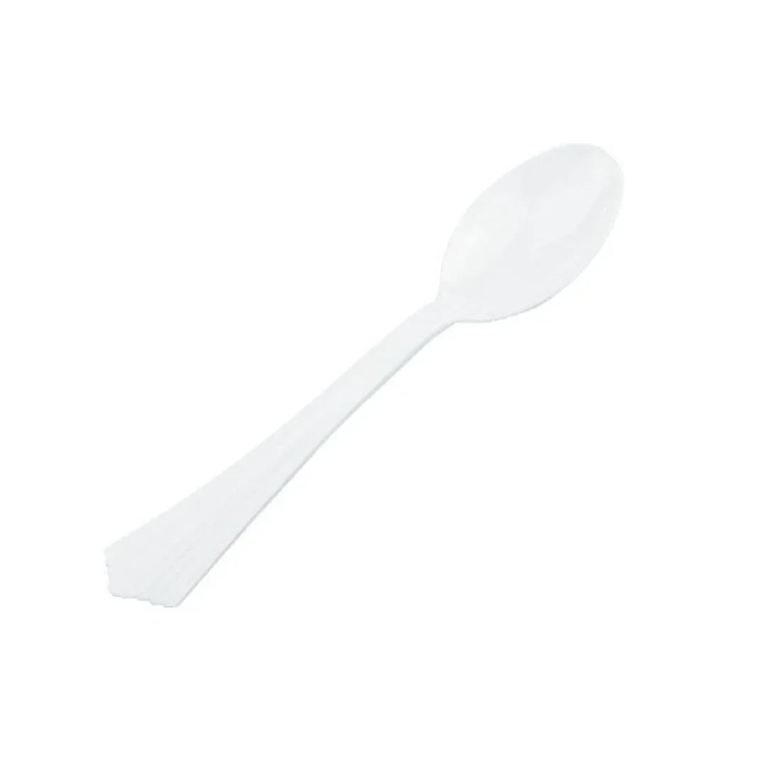 Single white disposable plastic spoon isolated on a white background
