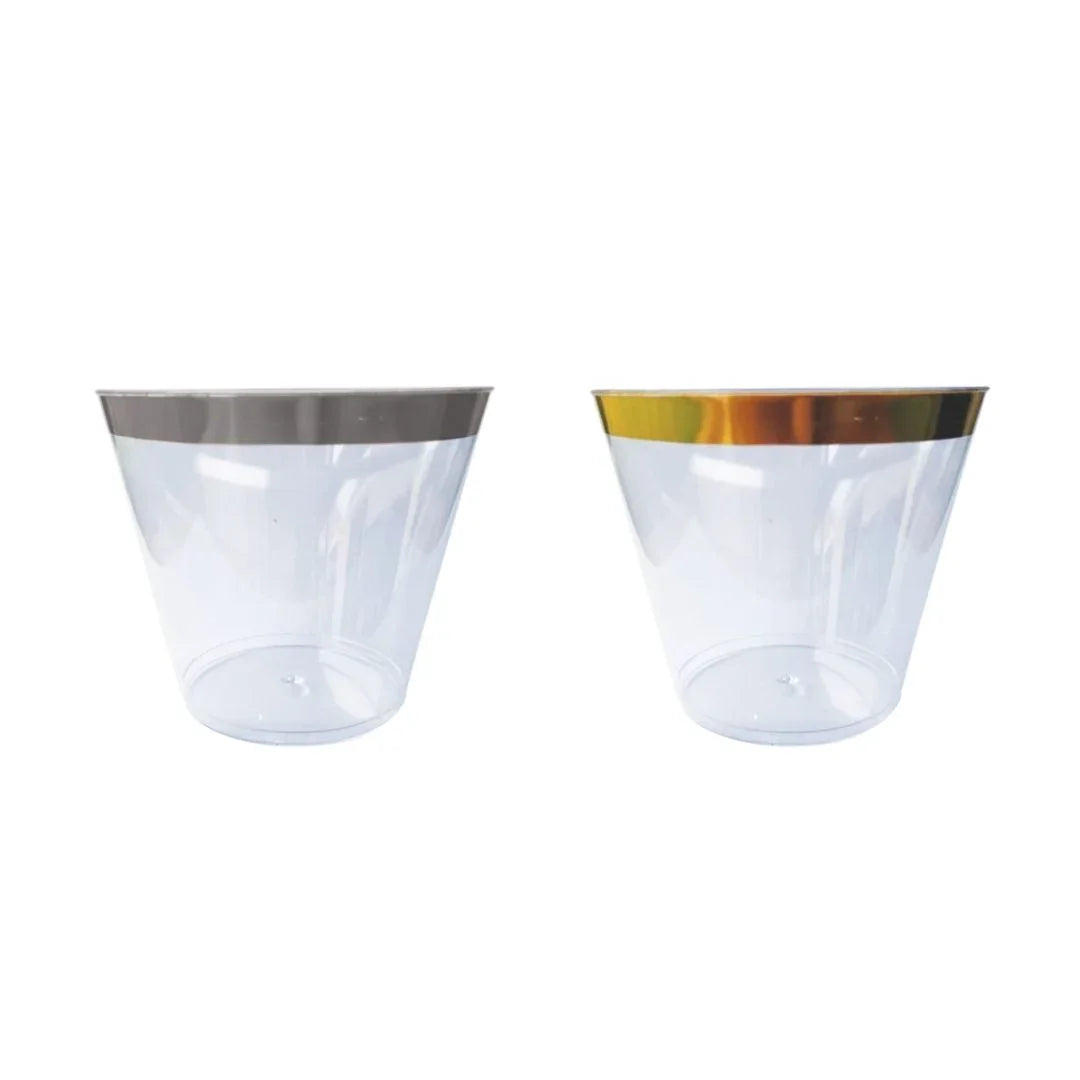 Two clear plastic disposable party cups, one with a silver rim and one with a gold rim.